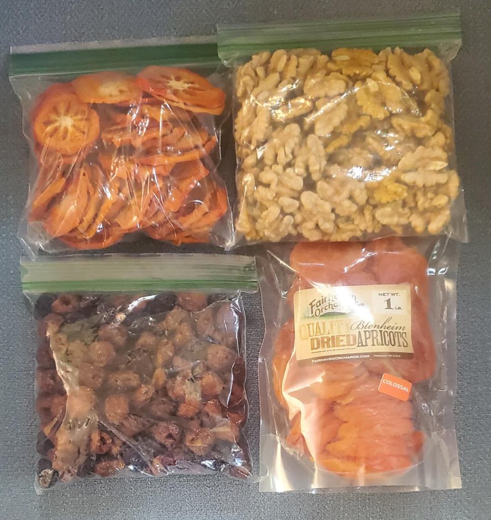 Dried fruit and nuts sealed up in plastic bags ready for posting